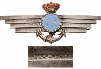 ROMANIA
Regimental Badge of the "Naval Aviation Flotilla, 1st Model"
Breast Badge, 71x29 mm, Silver, hallmarked "188-357", maker`s mark "IR - Ioseph...