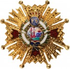 SPAIN
Royal Order of Isabel the Catholic
A lapel miniature of the Grand Cross in gold, 21 mm, with chiselled rays with red enameled arms; polychrome...
