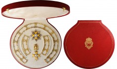 VATICAN
Order of the Golden Spur
A complete set of the Order: the badge, 105x56 mm, in gilt Silver and 
gold-yellow enamel the lower arm, fitted wi...