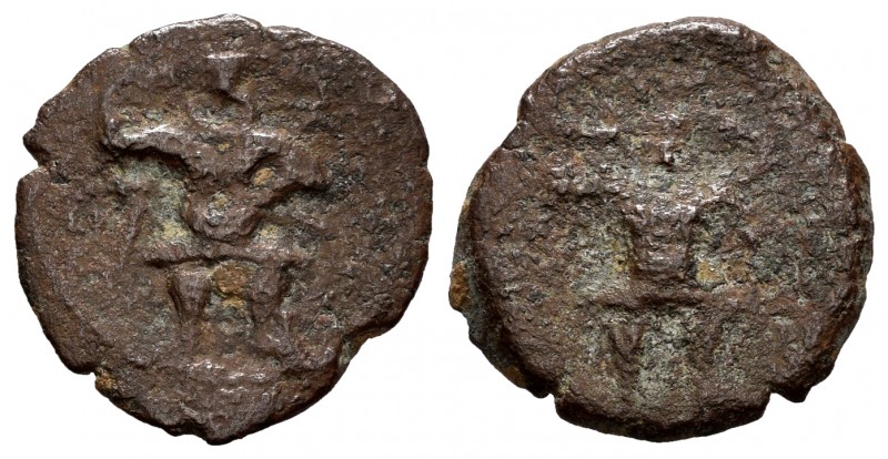 Ebusus. 1/4 calco. 300-200 BC. Ibiza. (Abh-909). Anv.: Bes with hammer and serpe...