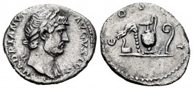 Hadrian. Denarius. 125-128 AD. Rome. (Ric-198). (Rsc-454). Anv.: HADRIANVS AVGVSTVS, laureate head right, with drapery on far shoulder. Rev.: COS III,...