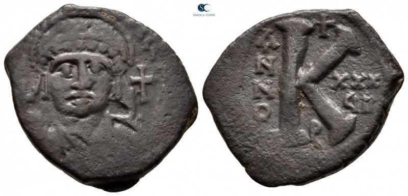 Justinian I AD 527-565. Theoupolis (Antioch)
Half Follis or 20 Nummi Æ

25 mm...