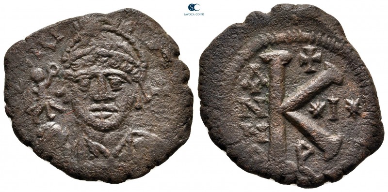 Justin II AD 565-578. Theoupolis (Antioch)
Half Follis or 20 Nummi Æ

27 mm, ...