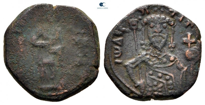 John II Comnenus AD 1118-1143. Thessalonica
Half Tetarteron Æ

14 mm, 1,62 g...