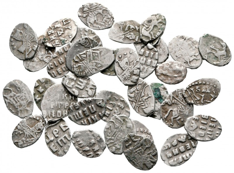 Lot of ca. 35 Russian Coins of Petr I the Great / SOLD AS SEEN, NO RETURN!

ve...