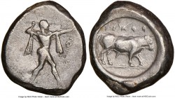 LUCANIA. Poseidonia. Ca. 470-420 BC. AR stater (19mm, 12h). NGC VF. ΠΟΣEΣ, Poseidon striding right, nude but for chlamys spread across shoulders, bran...