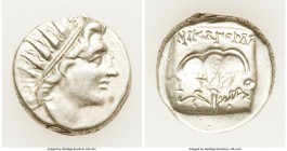 CARIAN ISLANDS. Rhodes. Ca. 88-84 BC. AR drachm (14mm, 3.07 gm, 12h). XF. Plinthophoric standard, Nicagoras, magistrate. Radiate head of Helios right ...