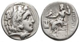 Kings of Macedonia, Philip III Arrhidaios, 323-317 BC, AR drachm, Kolophon Mint, ca. 323-319 BC.
Head of Herakles wearing lion's scalp right
Zeus seat...