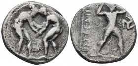 Pamphylia, Aspendos, ca. 380-325 BC, AR stater
Two wrestlers grappling, in the centre below ΔA
Slinger in short chiton standing right, shooting his we...