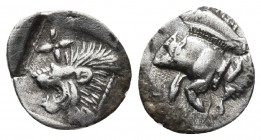 Mysia, Cyzicus, ca. 5th cent. BC, AR hemiobol
Forepart of boar left, behind tunny
Within incuse square head of lion left with star above
SNG COP 49. 
...