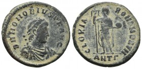 Honorius, ca. 392-395 AD, Antioch Mint, AE2
Diademed, draped and cuirassed bust of Honorius right
Emperor standing left with head turned right, holdin...