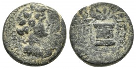 Phrygia, Dionysopolis, pseudo-autonomous issue, period of Tiberius, 14-37 AD, AE
Head of Dionysos wearing ivy wreath right
Cista mystica with crossed ...