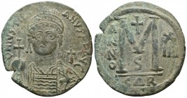 Justinian I 527-565 AD, AE follis, Carthage Mint, 540/541 AD.
DNIVSTINI-ANVSPPAVC, Facing bust of Justinian I cuirassed in plumed helmet, in right han...