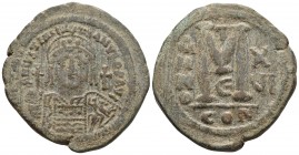 Justinian I 527-565 AD, AE follis, Constantinople Mint, 542/543 AD
DNIVSTINI-ANVSPPAVC Facing bust of Justinian I cuirassed in plumed helmet, in right...