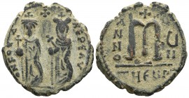 Phocas 602-610 AD, AE follis, Antioch (Theoupolis) Mint, 608-609 AD,
ONFOCA-NϵPϵAV, Phocas on left and Leontia on right standing facing, Phocas holds ...