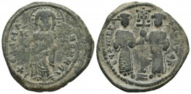 Constantine X 1059-1067 AD, AE follis, Constantinople Mint, 1059-1067
+ϵMMA-NOVHΛ, Christ standing facing on footstool, wearing nimbus cruciger, palli...