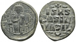 Anonymous follis class D (atributted to Constantine IX), AE Constantinople Mint, c. 1050-1060 AD
Christ seated facing on throne with back, wearing nim...