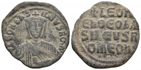 Leo VI 886-912 AD, AE follis, Constantinople Mint, 886/912 AD
+LϵOnbAS-ILϵVSROM' ,Crowned bust of Leo facing, with short beard, wearing chlamys, holdi...