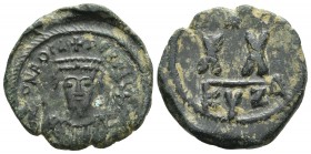 Phocas 602-610 AD, AE half follis, Cyzicus Mint, c. 606-610
ONFOCA-PERPAVC, Bust of Phocas facing, in crown with cross, wearing consular robes, in rig...