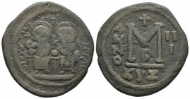 Justin II 565-578 AD, AE follis, Cyzicus Mint, 567/568 AD
DNIVSTNI-...PPSAC..., Justin II, on left, and Sophia, on right, seated facing on double thro...