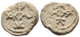Byzantine lead seal, c.VII 
Cruciform monogram. Θ central, at the end of left arm: K, right illegible, down C, upper υ. Probably invocation: Θεοτόκε β...