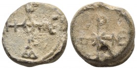 Byzantine lead seal, c.VII 
Cruciform monogram. Θ central, at the end of left arm: H, right ϵ, down A, upper illegible. 
Cruciform monogram. X central...