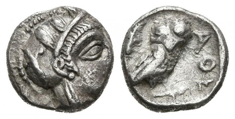 ATICA, Atenas. Obolo. (Ar. 0,69g/8mm). 454-404 a.C. Anv: Cabeza a derecha de Ate...