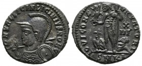 LICINIO II. Nummus. (Ae. 3,14g/19mm). 318-320 d.C. Cícico. (RIC 18). Anv: Busto con casco y coraza de Licinio II a izquierda, sosteniendo lanza en hom...