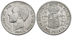 ALFONSO XII (1874-1885). 1 Peseta. (Ar. 5,00g/23mm). 1882 *18-82. Madrid MSM. (Cal-2019-20). Primera estrella apenas visible. MBC+.