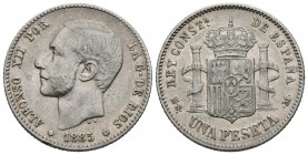 ALFONSO XII (1874-1885). 1 Peseta. (Ar. 4,99g/23mm). 1885 *18-85. Madrid MSM. (Cal-2019-24). MBC+. Primera estrella floja.