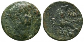 EASTERN CILICIA , Caesarea. Claudius. AD 41-54. Æ . Dated RY 5 (AD 46). Bare head right / Tyche seated right on rocks, holding grain ears; below, rive...