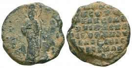 Byzantine lead seal N. imperial protospatharios,
(ca 11th cent.)

Obverse: A bishop saint standing facial, nimbate, in prelate's garments, blessing...