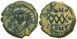 Byzantine Coins Ae, Phocas (602-610 AD). AE Follis

Condition: Very Fine

Weight: 12.4 gr
Diameter: 29 mm