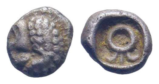 LYDIA. Uncertain. 5th century BC. AR Hemiobol. Head of lion right / Uncertain sy...