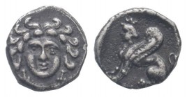 CILICIA. Uncertain. 4th century BC. AR Obol. Gorgoneion facing, wearing triple-pendant earrings / Sphinx seated left. SNG France 479; SNG Levante 250;...