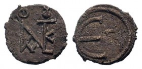 JUSTIN II.565-578 AD. Constantinople mint. AE decanummium.Monogram / Large epsilon, officina letter to right. No mintmark. Sear 363; DOC 60.Good fine....