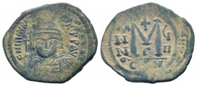 MAURICE TIBERIUS. 582-602 AD. Constantinople mint.AE Follis.DN mAVRIC TIBER PP AVI, crowned, cuirassed bust facing, holding cross on globe and shield ...