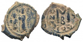 HERACLIUS. HERACLIUS CONSTANTINE and MARTINA.610-641 AD.Constantinople mint.AE Follis.Heraclius, in center, flanked by Martina, on left, and Heraclius...