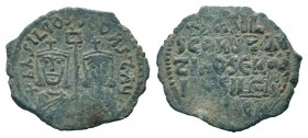 BASIL I & CONSTANTINE.867-886 AD.Constantinople mint.AE Follis.ЬASILIOS S COҺST AЧGG, Crowned facing busts of Basil and Constantine, holding labarum b...
