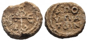 BYZANTINE LEAD SEAL.Circa 8 - 9 th Century.PB Seal. Cruciform invocative monogram / Greek inscription in four lines.very fine.

Weight : 15.2 gr

Diam...