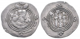 SASANIAN KINGSAD.Khosrau II. 591-628 AD.Rayy mint. AR Drachm. Crowned bust right / Fire altar with ribbons and attendants; star and crescent flanking ...