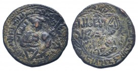 AYYUBID.al Ashraf Musa.1210-1220 AD.Mayyafariqin mint.608 AH. AE Dirham.Turbaned prince seated facing, right leg drawn up, holding globe in right hand...