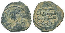 ARTUQIDS.Fakhr al-Din Qara Arslan.1148-1174 AD.AE Dirhem. Facing bust of Christ Pantokrator / Partial mint formula and name and pedigree of Fakhr al-D...