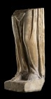 PORZIONE DI STATUA MARMOREA PANNEGGIATA
 I - II secolo d.C.; alt. cm 55,5; base cm 18 x 23; Porzione inferiore di statua femminile finemente scolpita...