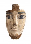 MASCHERA LIGNEA DI SARCOFAGO EGIZIO
 Periodo Tardo, ca. 664 – 332 a.C.; alt. cm 19; alt. cm 26 (con base); Maschera egizia funeraria in legno stuccat...