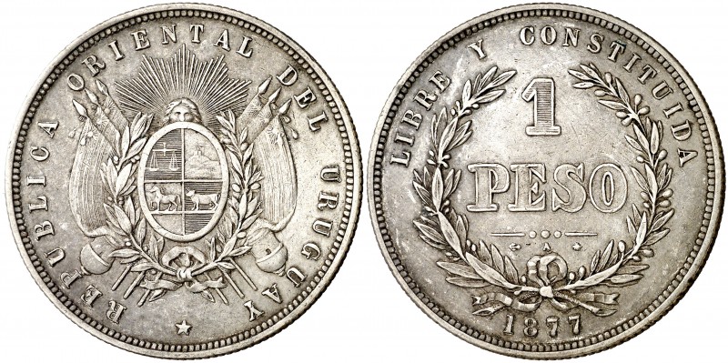 Uruguay. 1877. A (París). 1 peso. (Kr. 17). AG. 25,01 g. MBC+.