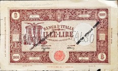 Banconote. Regno D'Italia. Vittorio Emanuele III. 1.000 Lire Grande M. (Fascio). D.M 12 Dicembre 1942. Gig. BI45A. MB. Piegahe, strappi, foro centrale...