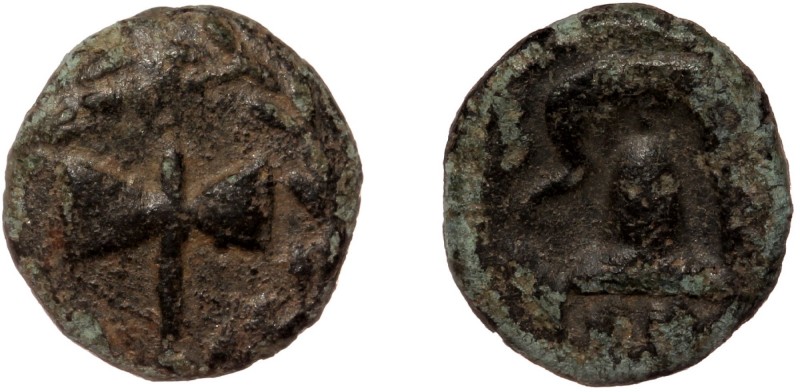 Macedonia, AE11 quarter unit, ca 323-317 BC. . 
bipennis within wreath 
B-[A] (?...