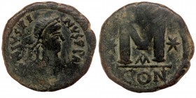JUSTIN I (518 - 527). AE32 Follis. Constantinople.
Obv: D N IVSTINVS P P AVC Diademed, draped and cuirassed bust right.
Rev: Large M between two stars...