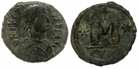 Justin I (518-527) AE30 Follis, Constantinople mint, 1st officina. Struck 518-527. 
DN IVSTI-NVS, diademed bust righ
Rev: Large M; cross above, stars ...